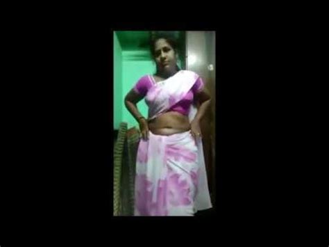 mallu aunty|Tamil Mom dress change captured his neighbours son